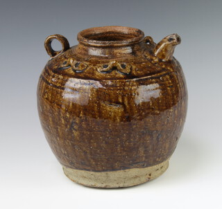 A Chinese provincial brown slip glaze baluster pot with simple spout and handle with applied bow decoration 22cm 