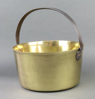A 19th Century circular brass preserving pan with polished steel handle 38cm h x 33cm diam. 