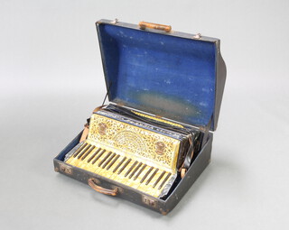 A Vickers Super Special accordion with 121 buttons (some cracked) complete with carrying case 