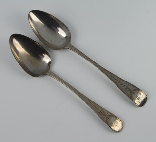 Two George III silver bright cut tablespoons, Exeter 1790 and 1813, 190 grams 