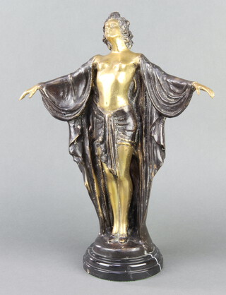 An Art Deco style bronze figure of a standing lady raised on a circular black marble socle base 40cm h x 13cm diam. 