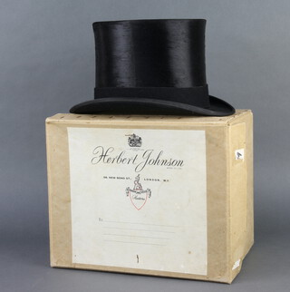 Herbert Johnson, a gentleman's black silk top hat, size 7 1/4, complete with box 