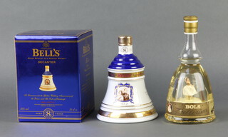 A Bells Wade whisky decanter to celebrate the 50th Golden Wedding Anniversary of The Queen and HRH Prince Philip boxed, together with a bottle of Bols Gold Liqueur 