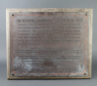 A brass plaque removed from one of the Brighton Hospitals marked The visiting committee for the year 1913 caused this ward to be nearly doubled in size, raised on an oak plaque 51cm h x 61cm w 