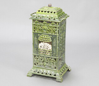 A Victorian green enamelled cast iron stove case 65cm h x 27cm w x 23cm d 