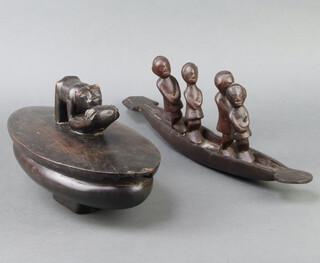 An Eastern oval carved wooden trinket box, the lid with stylised monkey 20cm h x 32cm w x 17cm d  (chips to lid), together with a carved hardwood boat with 3 standing figures 17cm h x 47cm w x 8cm d 