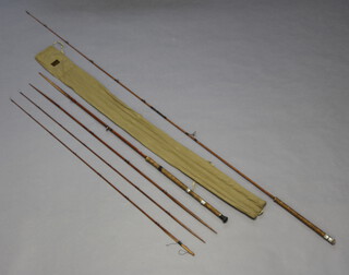 Sharpes of Aberdeen, a 2 piece fishing rod with extra tips in original bag together with a 2 piece split cane fly rod 