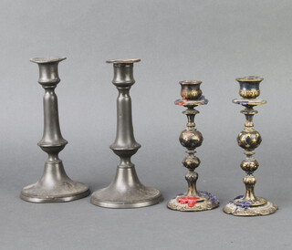 A pair of 19th Century pewter candlesticks with ejectors 20cm (1 with slight dent to base) and 1 other pair by Elkington Mason & Co 17cm x 7cm 
