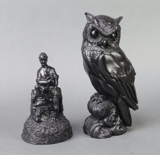 Kingmaker, a coal sculpture of a standing miner 16cm x 10cm x 30cm together with a ditto of an owl 22cm x 9cm x 7cm 