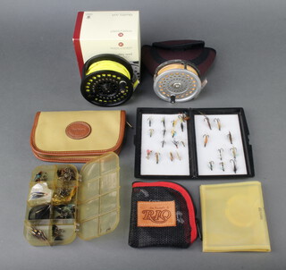 A Hardy Viscount Disc LA 10/11 fishing reel in original box, a Hardy Marquis 10 line weight reel (some corrosion) with pouch, a plastic 8 section fly box, etc 
