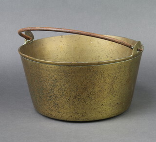 A 19th Century brass preserving pan with iron swing handle 16cm x 27cm 
