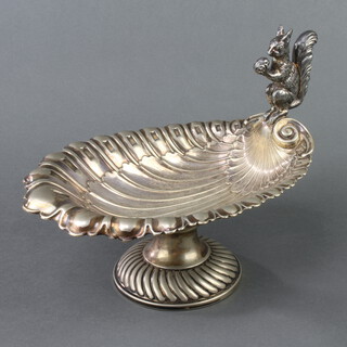 An Edwardian silver plated shell shaped nut bowl with squirrel handle 