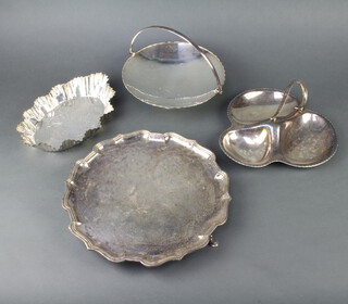 A silver plated Chippendale rim salver, raised on hoof feet 31cm, basket and 2 dishes 