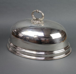 An Edwardian oval silver plated meat cover engraved with a crest 43cm 