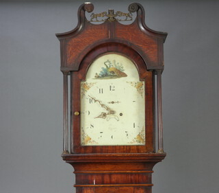An 18th Century 8 day striking on bell longcase clock, the 33cm arched dial painted a peacock with minute indicator and calendar aperture, contained in an inlaid oak case with reeded columns to the sides, complete with pendulum and key   235cm h 