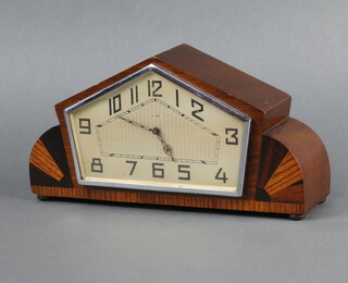 An Art Deco 8 day timepiece, the arch shaped dial with Arabic numerals contained in an inlaid mahogany case 13cm h x 26cm w x 7cm d 