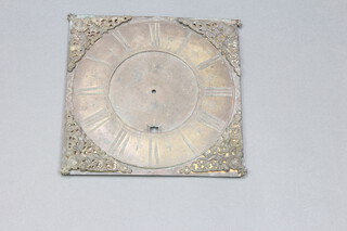 John Sellwood of Abingdon, an 18th Century square gilt longcase clock dial 26cm, with Roman numerals, calendar aperture and 4 pierced gilt metal spandrels (loose)  