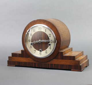 An Enfield Art Deco chiming mantel clock with silvered chapter ring and Arabic numerals contained in an inlaid oak stepped case 24cm h x 39cm w x 14cm d, complete with pendulum (no key)  