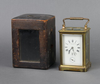 A 19th Century striking carriage alarm clock, striking on 2 gongs, contained in a gilt metal case, the enamelled dial with Roman numerals marked Gamerden and Foster New York, complete with leather carrying case and key 12cm h x 8cm w x 7cm d 