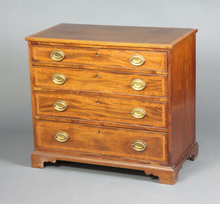 A 19th Century inlaid mahogany and crossbanded chest of 4 long drawers with replacement brass oval drop handles, raised on bracket feet 77cm h x 86cm w x 46cm d 
