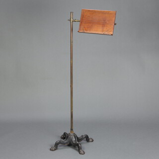 Carter Limited, an Edwardian mahogany brass and iron music/reading stand, raised on a brass pole with iron base, 125cm h x 43cm w, impressed to the back of the reading stand 859222 by Appointment to HM King, Carter Ltd  