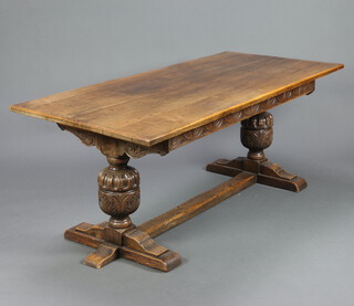 A 17th/18th Century style oak refectory dining table, raised on carved cup and cover supports with H framed stretcher 74cm h x 181cm l x 81cm w (slight contact marks to the top) together with a set of 6 oak framed Cromwellian dining chairs, with upholstered seats and backs, raised on turned and block supports with box framed stretchers - 2 carvers 81cm h x 52cm w x 41cm d (seat 35cm x 35cm) and  4 standard chairs 80cm h x 49cm w x 40cm d (seat 28cm x 28cm)