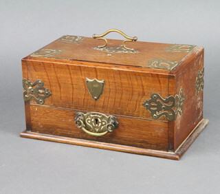 A Victorian mahogany and brass banded cigar box with sliding top and drawer marked RD225578 16cm h x 32cm w x 19cm d 
