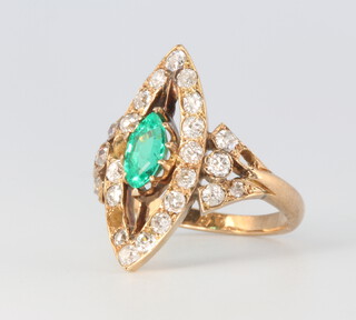 A yellow metal oval emerald and diamond up finger ring, lacking 3 diamonds, 4 grams size M
