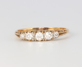 An 18ct yellow gold 5 stone diamond ring approx. 0.2ct, 2.4 grams, size P 
