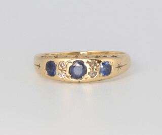 An 18ct yellow gold sapphire and diamond ring 3.6 grams, size N 