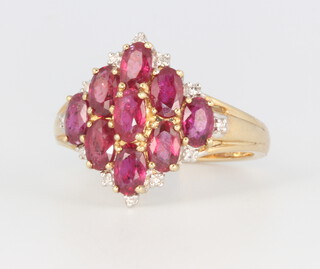 A 9ct yellow gold ruby and diamond ring, 3.5 grams, size O 1/2