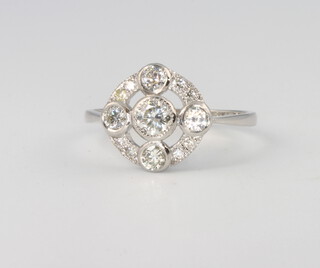 A platinum Art Deco style diamond cluster ring 0.8ct, 4 grams, size N 1/2
 