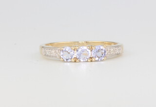 A 9ct yellow gold diamond and tanzanite ring 1.8 grams, size P 