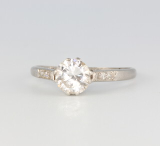 A white metal single stone brilliant cut diamond ring approx. 1ct, (minor chip), colour F/G, 2.2 grams, size N 