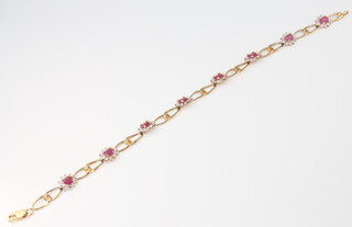 A 9ct yellow gold ruby and diamond bracelet 5.7 grams, 18cm 