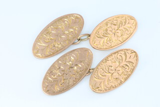 A pair of 9ct yellow gold engraved cufflinks 3.9 grams