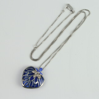 A silver and enamelled heart shaped pendant and chain 