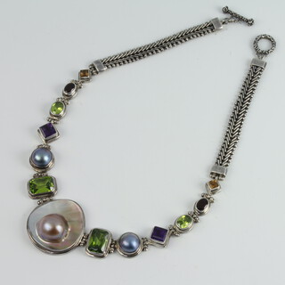A 925 shell and hardstone set necklace 