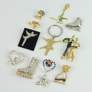 A quantity of ice skating brooches and badges