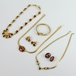 A quantity of gilt and enamelled vintage costume jewellery 