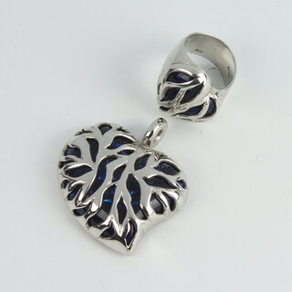 A silver and enamelled heart pendant and matching ring, gross 41 grams