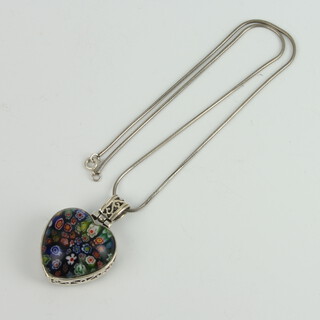 A silver mounted millefiori heart shaped glass pendant and chain 