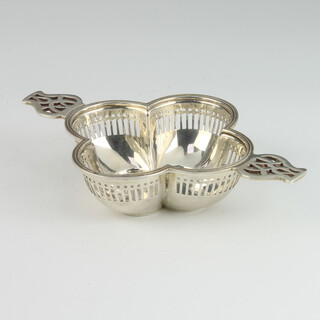 A George V pierced silver bowl with pierced handles, Edinburgh 1910, maker Hamilton & Inches 72 grams, 15cm   
