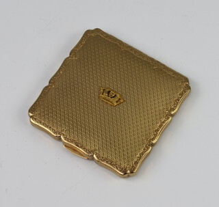 A gilt cased Stratton compact with coronet decoration 