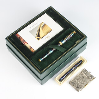 A gentleman's Cross pen contained in a marbled case with 18ct nib boxed, together with a small Dinkie 550 pen and a repousse aide memoire 