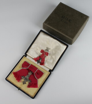 A lady's second class MBE dress badge with miniature in original box 