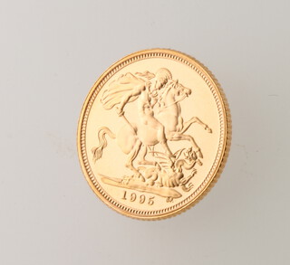 A 1995 proof half sovereign, cased 