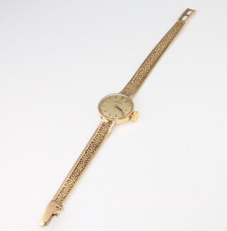 A lady's 9ct yellow gold Omega wristwatch on a ditto bracelet 10 grams 