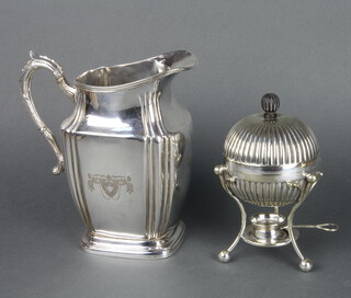 An American style silver plated water jug together with an egg coddler 