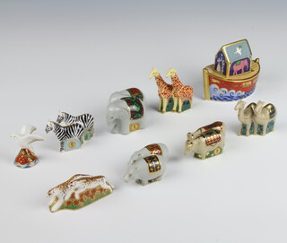 A Royal Crown Derby Imari pattern Noah's Ark 8cm together with a pair of giraffes 7cm, camels 5cm, elephants 4cm, cheetahs 3cm, zebras 4cm, hippopotami 3cm, oxon 3cm and a dove 4cm 